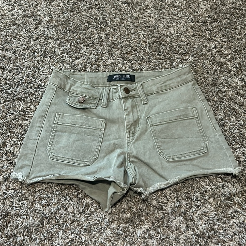 Light army green Jean shorts brand is Judy blue and size is 25.